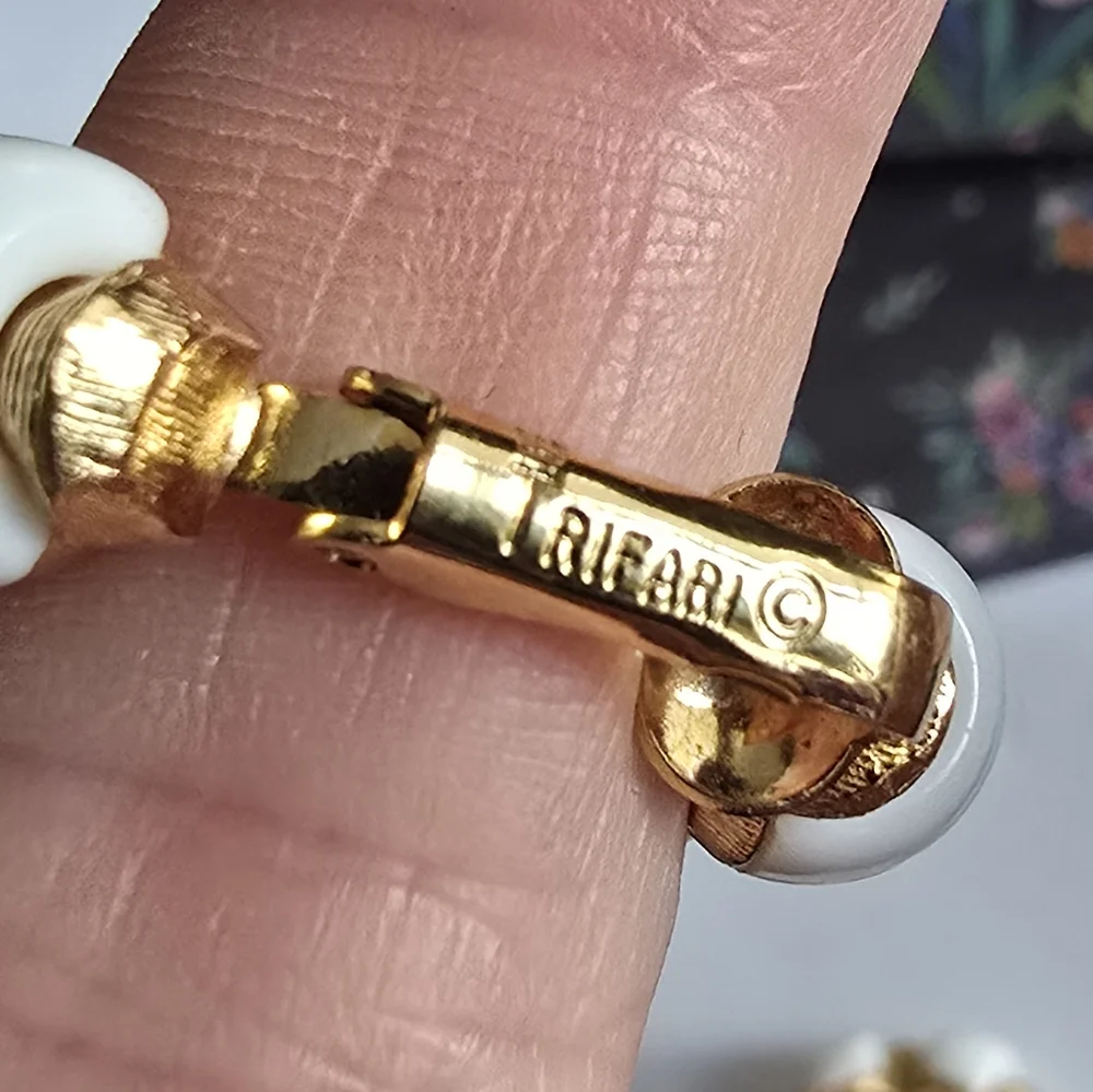 Vintage Trifari earrings Crown hoop white plastic gold tone metal clip on